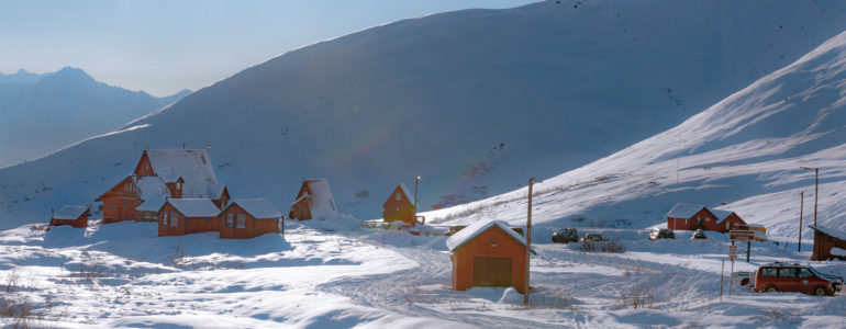 houses and sheds in feet of snow