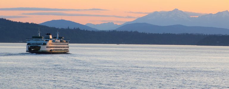 Image of water in the PNW and a ferry