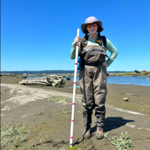 EarthLab Summer 2024 intern and NextGen Narrative contributor McKenna Sweet doing field work for her internship with The Nature Conservancy.